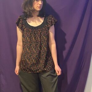 Black Top with Colorful Swirl Pattern